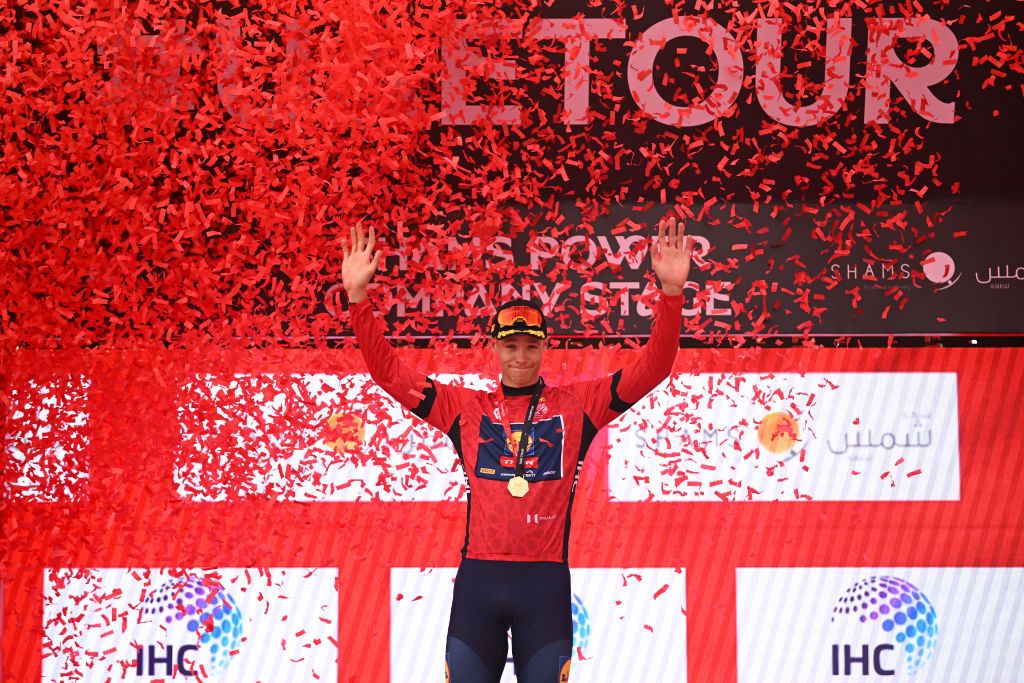 LIWA PALACE ABU DHABI UNITED ARAB EMIRATES FEBRUARY 17 Jonathan Milan of Italy and Team LidlTrek celebrates at podium as Red Leader Jersey winner during the to the 7th UAE Tour Stage 1 a 138km stage from Madinat Zayed Shams Solar Park to Liwa Palace UCIWWT on February 17 2025 in Liwa Palace Abu Dhabi United Arab Emirates Photo by Dario BelingheriGetty Images