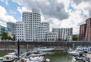 Media Harbour - MedienHafen - on the banks of the Rhein in Dusseldorf. Featuring Frank Gehry's striking buildings - Neuer Zollhof - completed in 1998
