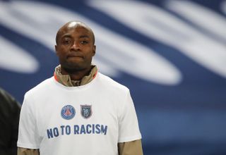 Pierre Webo wears a 'No to Racism' T-shirt ahead of the match restarting on Wednesday