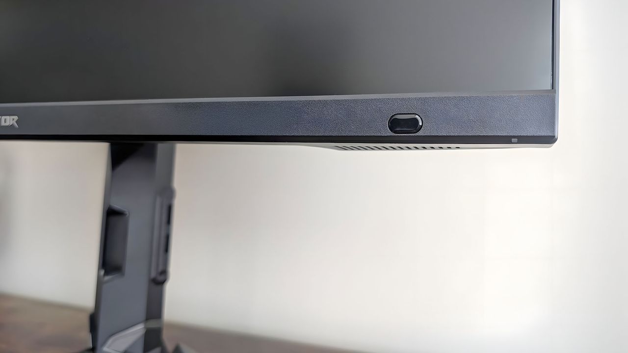 A closeup of the sensor on bottom right corner of the Acer Predator XB273K.