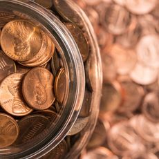 glass jar of copper pennies