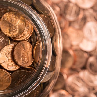 glass jar of copper pennies