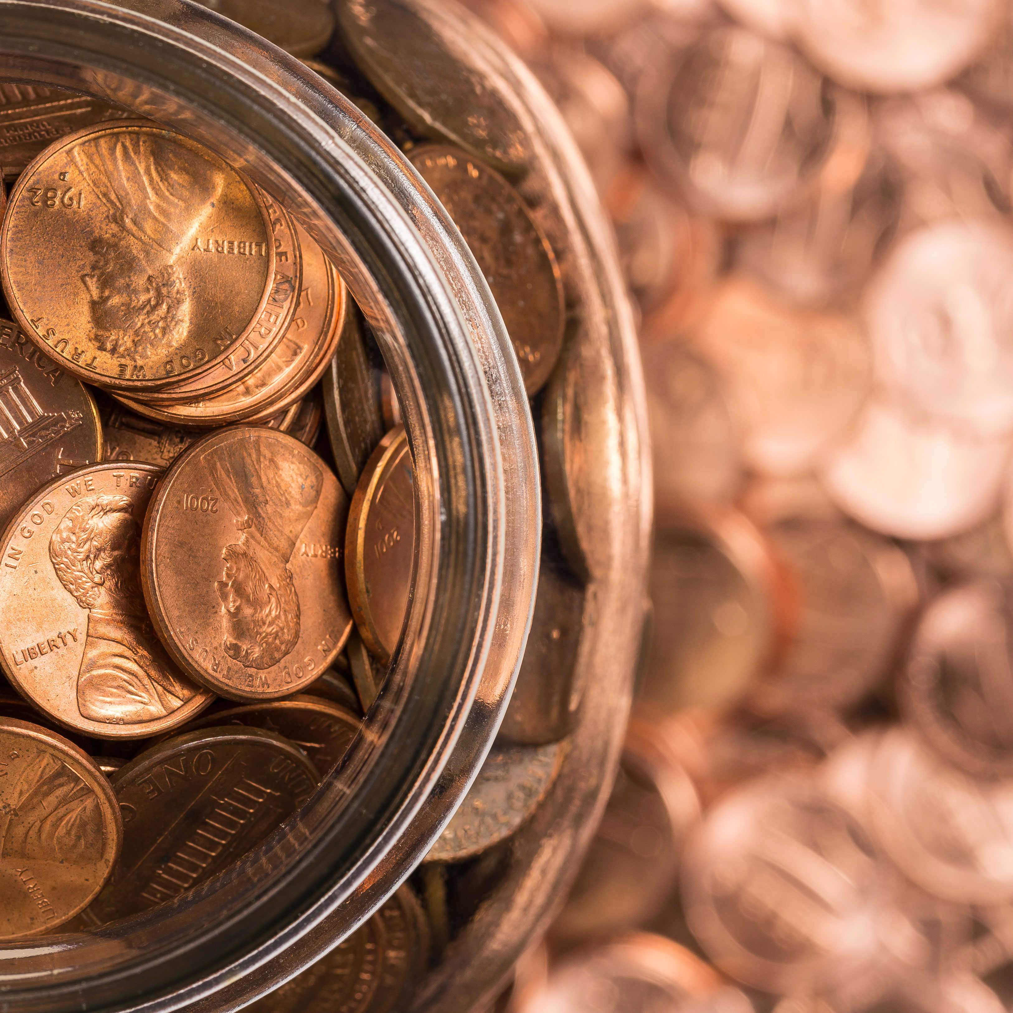 glass jar of copper pennies