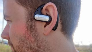 The OpenRock Pro on a user's ear.