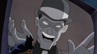 Batman watches Riddler's message on Batman: The Animated Series