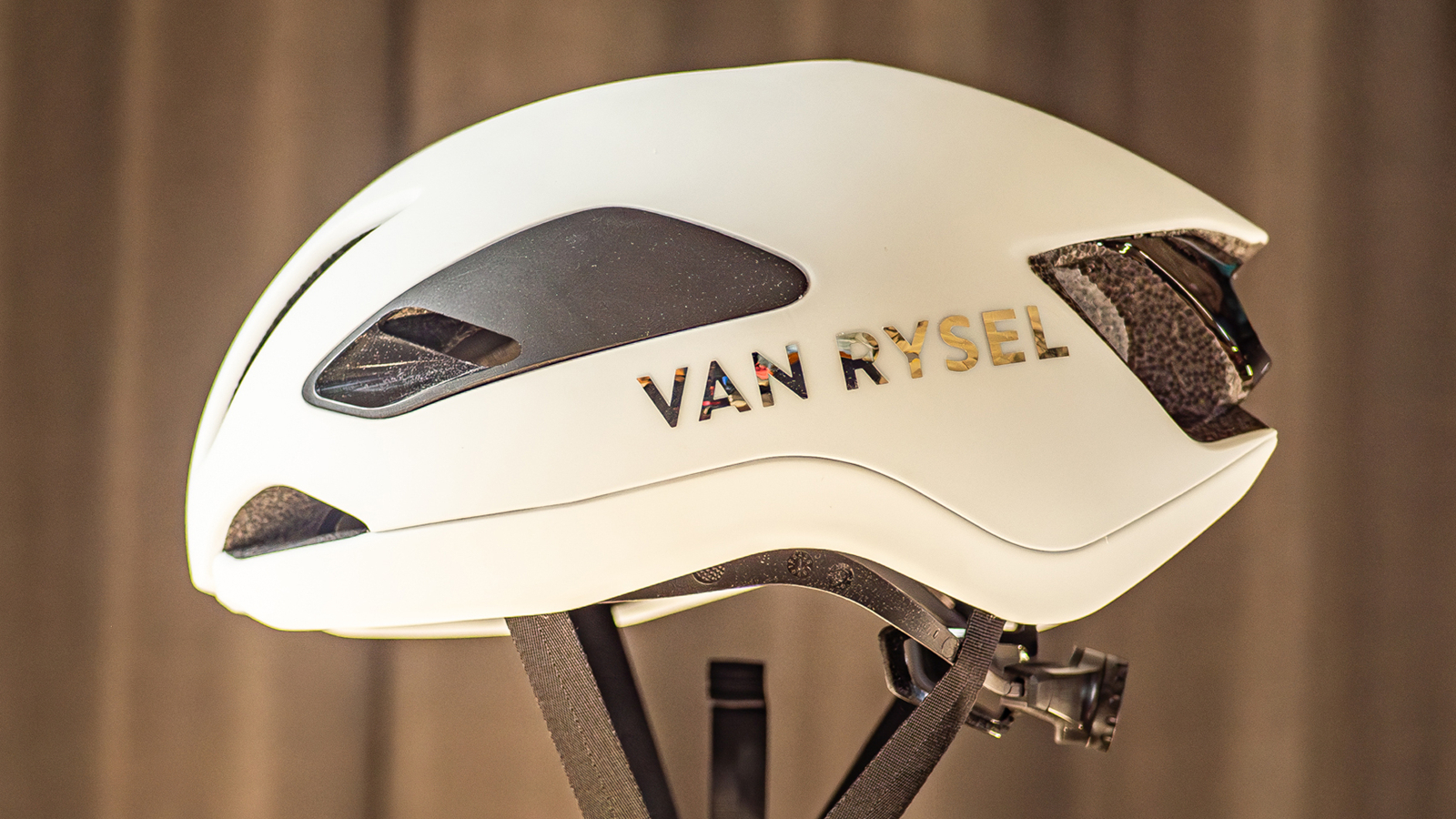 The Van Rysel FCR helmet on a plain background