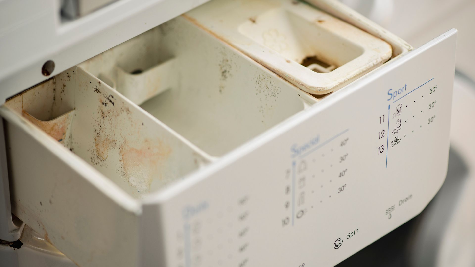 picture of dirty detergent drawer