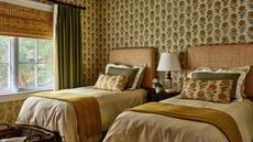 yellow floral twin bedroom with wallpaper and country decor