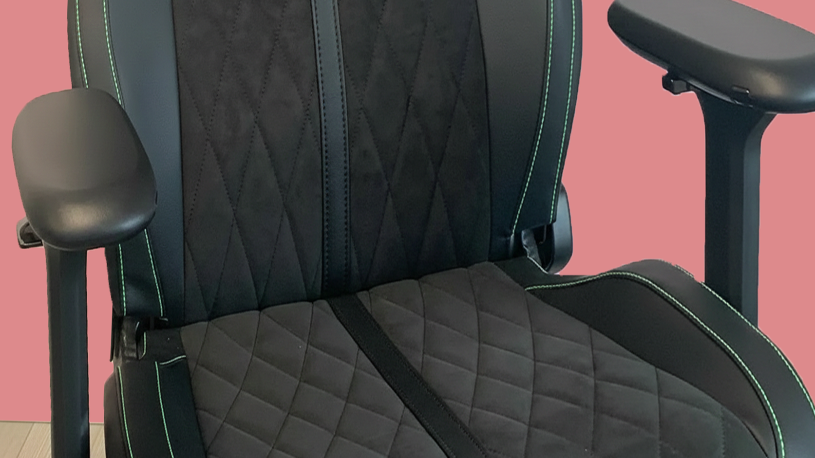 The Razer Enki Pro gaming chair in a colorful gaming and office set-up.