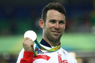 Mark Cavendish smiles with his silver medal