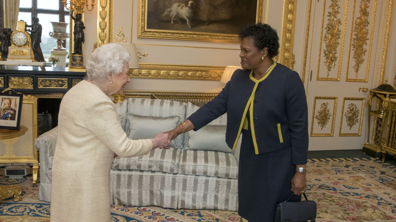 The Queen greets Governor-General of Barbados Dame Sandra Mason at Buckingham Palace 