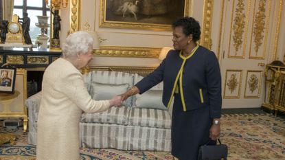 The Queen greets Governor-General of Barbados Dame Sandra Mason at Buckingham Palace 