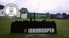 Main image of a Joburg Open tee marker in the foreground of a tee box with a Bazza's Best Bets sticker in the top-left corner