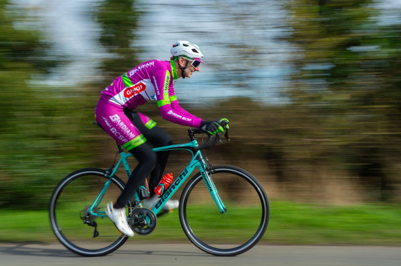 Adam Jones riding a Bianchi in purple Bardiani kit