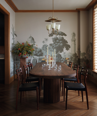 contemporary designed dining table with mural on back wall