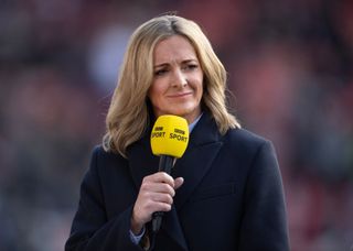 BBC Sport presenter Gabby Logan during the Vitality Women's FA Cup Semi Final between Manchester United and Brighton & Hove Albion at Leigh Sports Village on April 15, 2023 in Leigh, England.