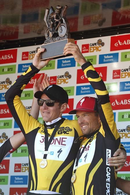 Jaroslav Kulhavy and Christoph Sauser of Burry Stander-Songo on the podium