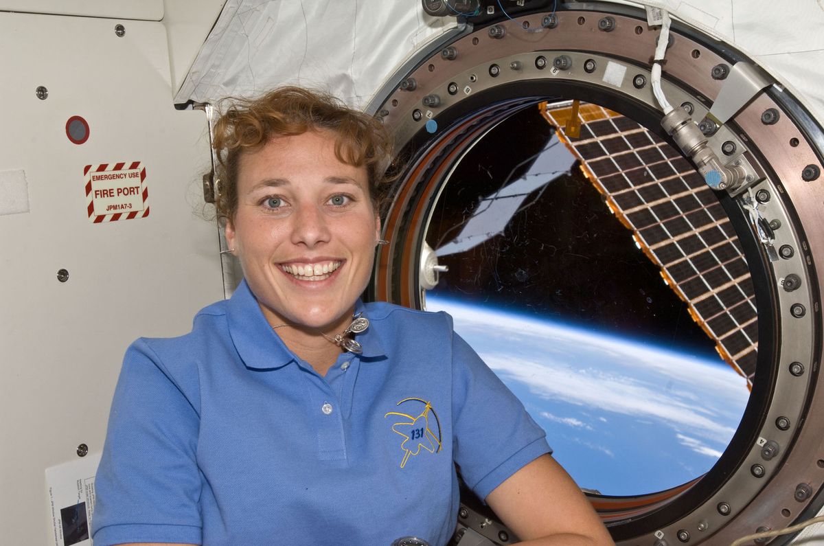 NASA astronaut Dorothy Metcalf-Lindenburger, STS-131 mission specialist, poses for a photo near a window in the Kibo laboratory of the International Space Station, on April 14, 2020.