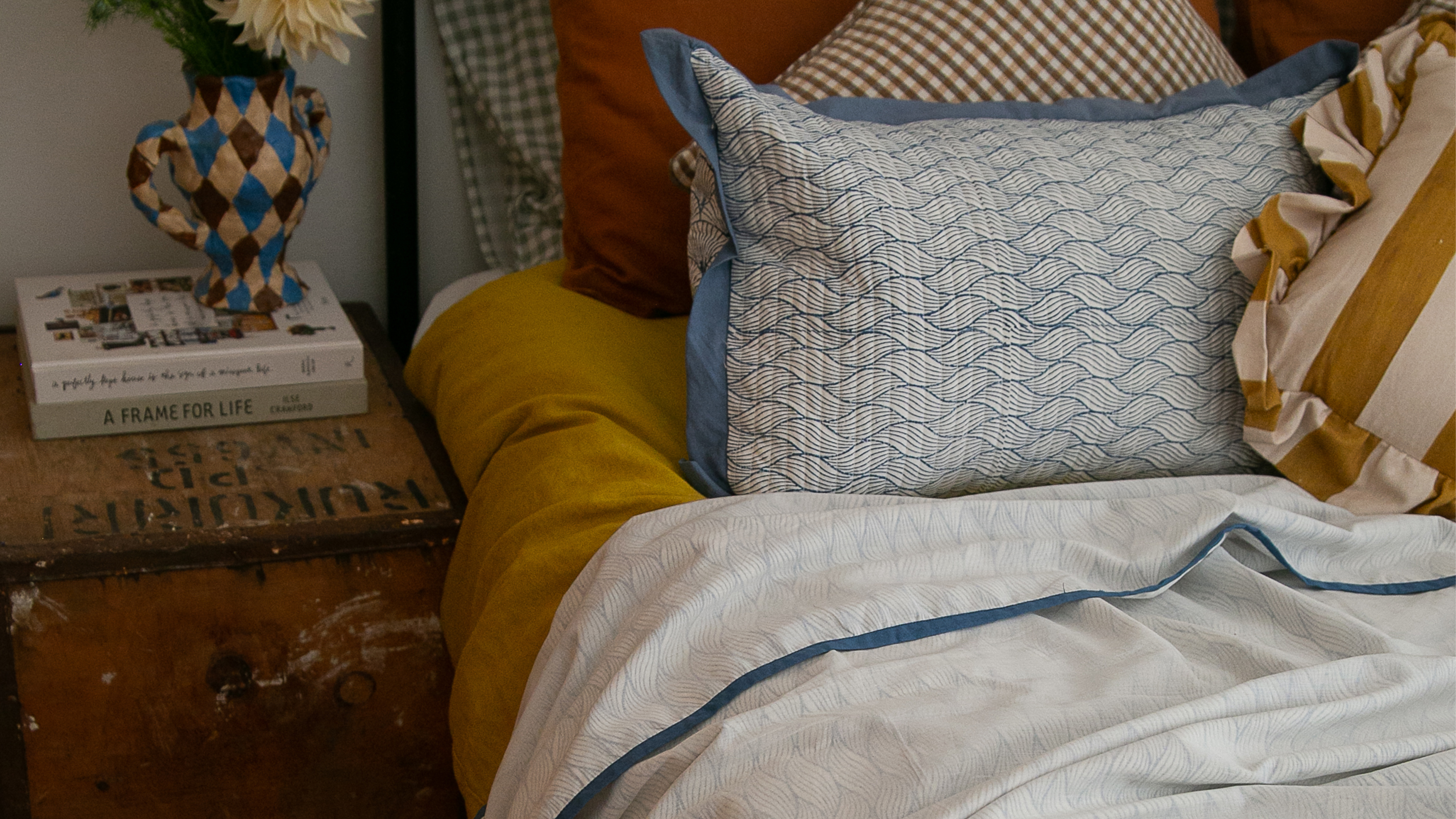 An Indian Dohar blanket on a bed