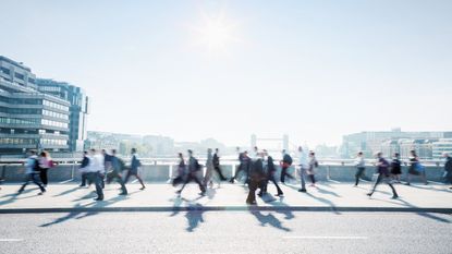 Workers walking through the City of London