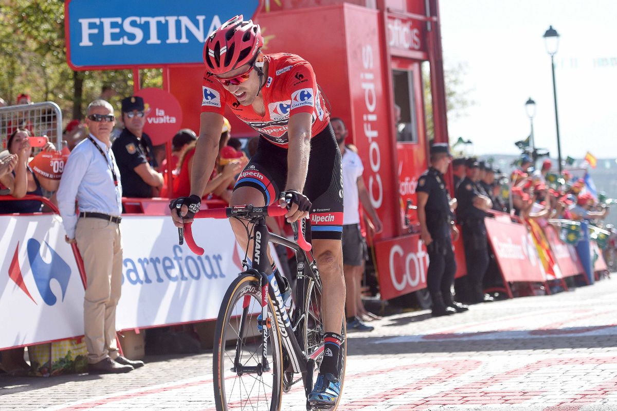 Tom Dumoulin crosses the stage 6 finish line