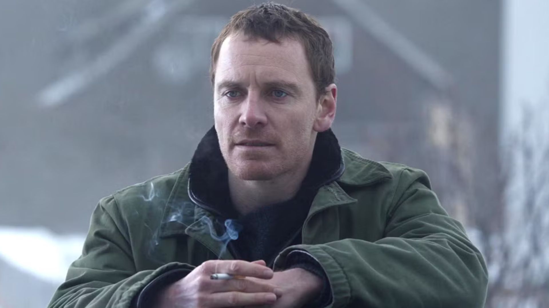 Michael Fassbender looks at something offscreen