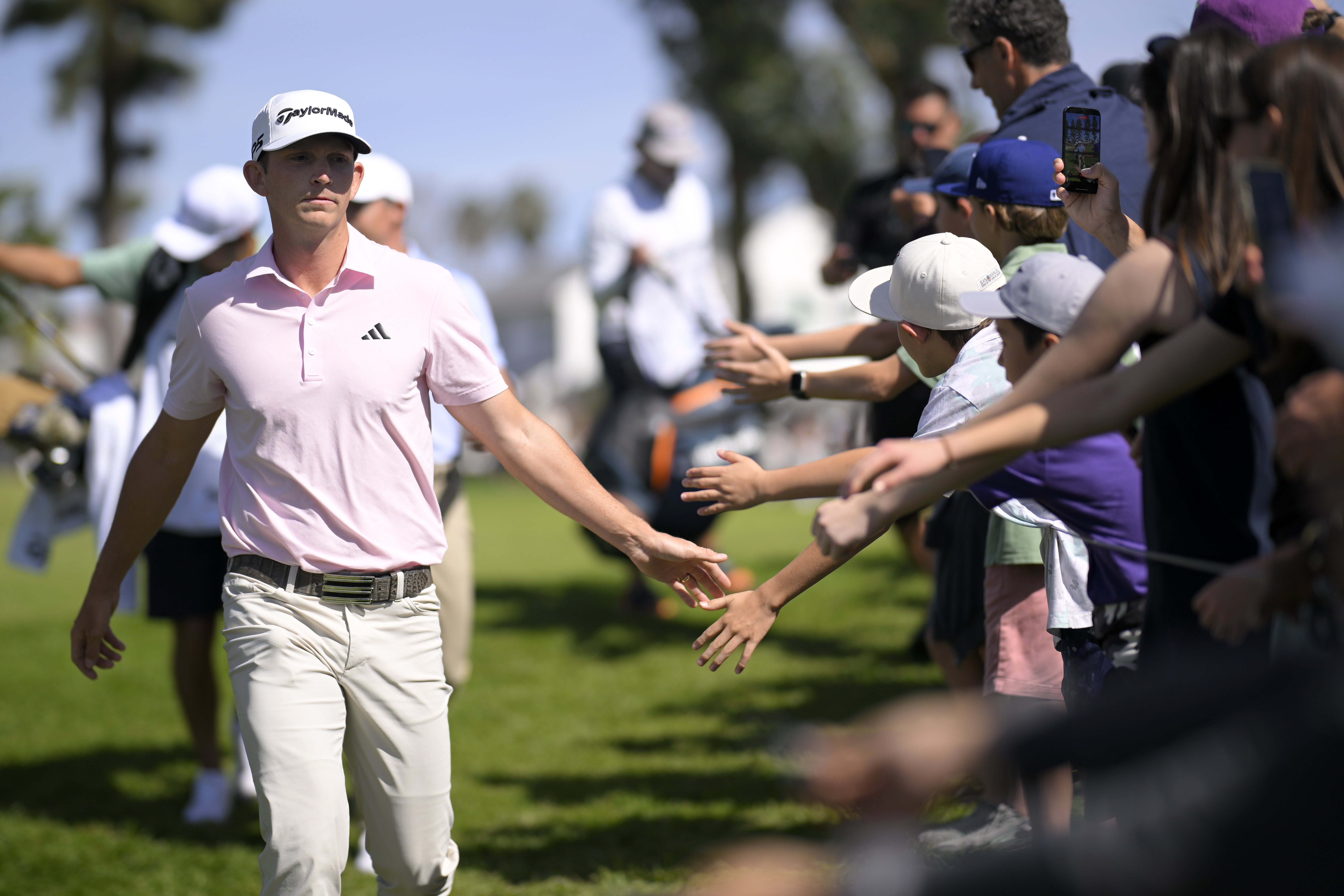 Jacob Bridgeman shakes hands