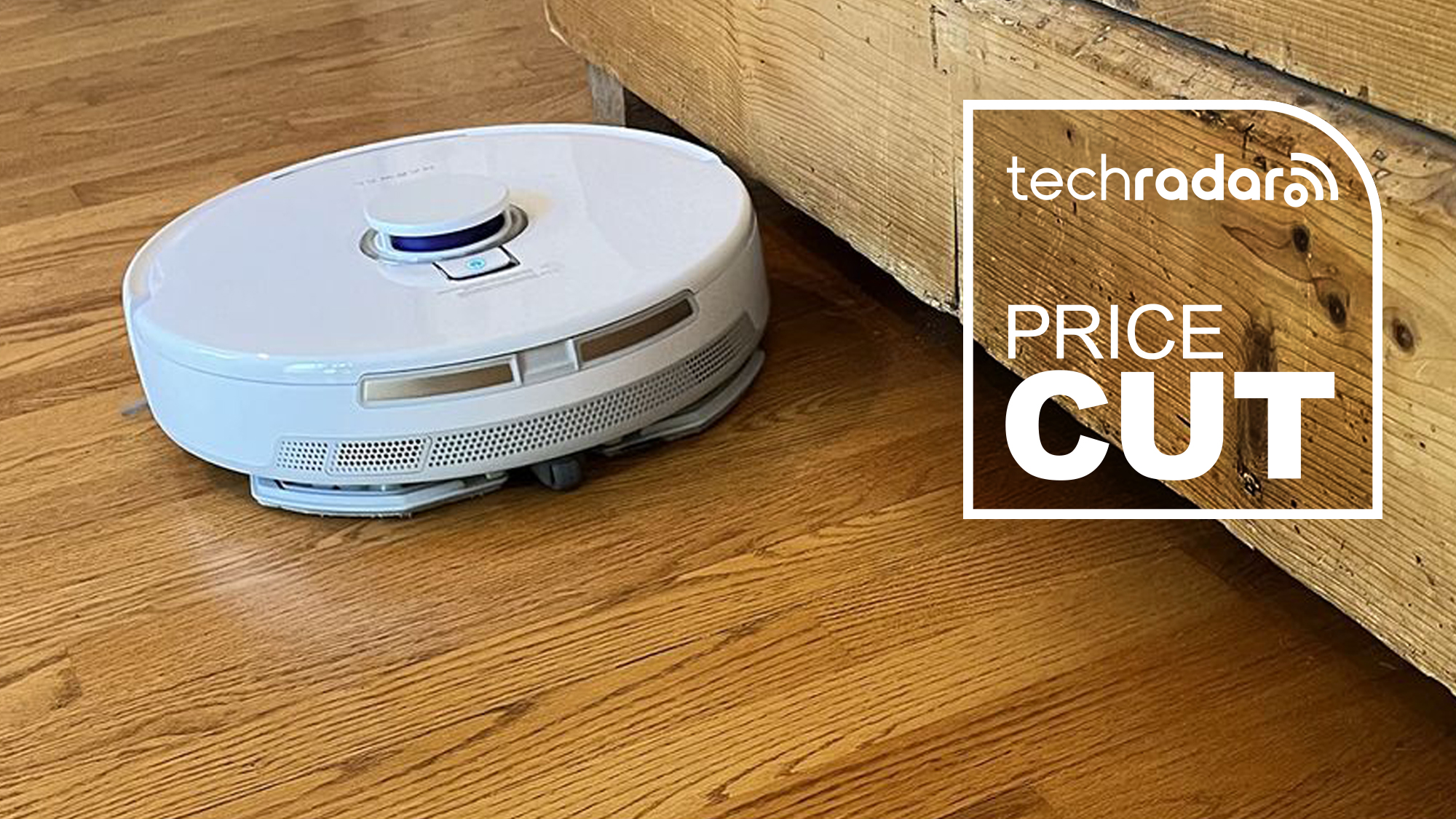 Narwal Freo X Plus vacuum on wooden floor