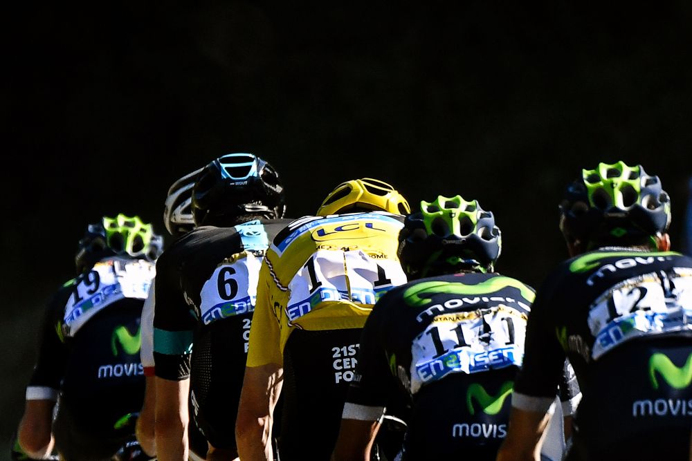 Chris Froome rides in the bunch during stage 15 at the Tour de France