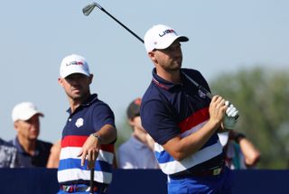 Brian Harman and Wyndham Clark practice prior to the Ryder Cup