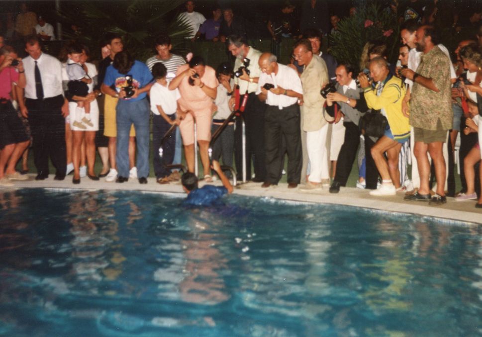 Post-race celebrations included a dip in the hotel swimming pool