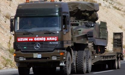 A Turkish military truck transports a mobile missile launcher to the Syrian border: Turkey deployed antiaircraft units along its border with Syria following the downing of one of its warplane