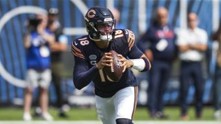 Quarterback Caleb Williams #18 of the Chicago Bears drops back to pass ahead of the Bears vs Texans live stream