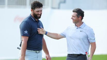 Jon Rahm and Rory McIlroy during the Tour Championship at East Lake Golf Club