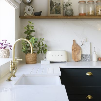 Navy shaker kitchen with white worktops