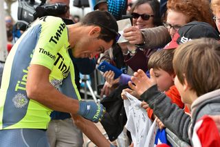 Alberto Contador interacts with fans befor the stage 1 start at Volta a Catalunya