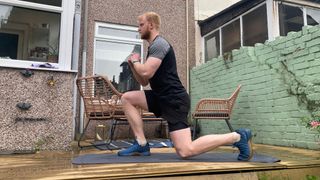 Fit&Well fitness writer Harry Bullmore performing a reverse lunge