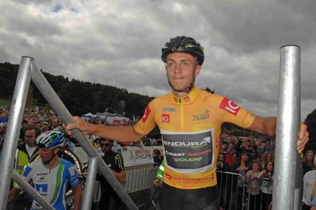 Race leader Jonathan Tiernan Locke goes to sign in