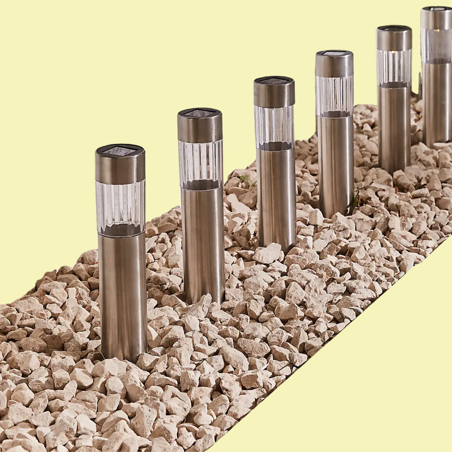 A set of six silver outdoor stake lights