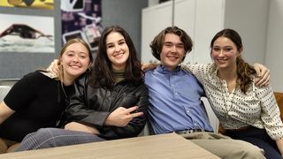 The Last Dungeon made in Unreal Engine 5; four students hug one another