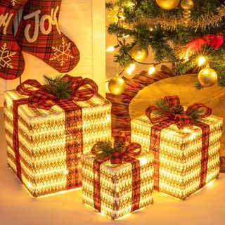 The Sunnyglade Set of 3 Christmas Lighted Gift Boxes Decoration Boxes under a Christmas tree