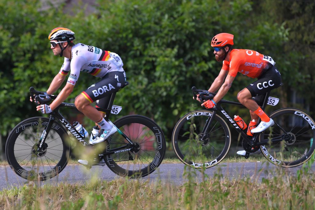 KRAKOW POLAND AUGUST 09 Maximilian Schachmann of Germany and Team Bora Hansgrohe Simon Geschke of Germany and CCC Team during the 77th Tour of Poland 2020 Stage 5 a 188km stage from Zakopane to Krakow TourdePologne tdp20 on August 09 2020 in Krakow Poland Photo by Luc ClaessenGetty Images