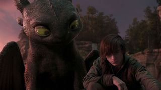 Toothless and Mason Thames as Hiccup in How to Train Your Dragon
