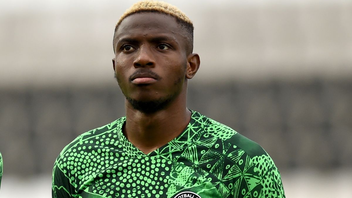 Victor Osimhen in green Nigeria soccer strip looks on ahead of Nigeria vs Equatorial Guinea at AFCON 