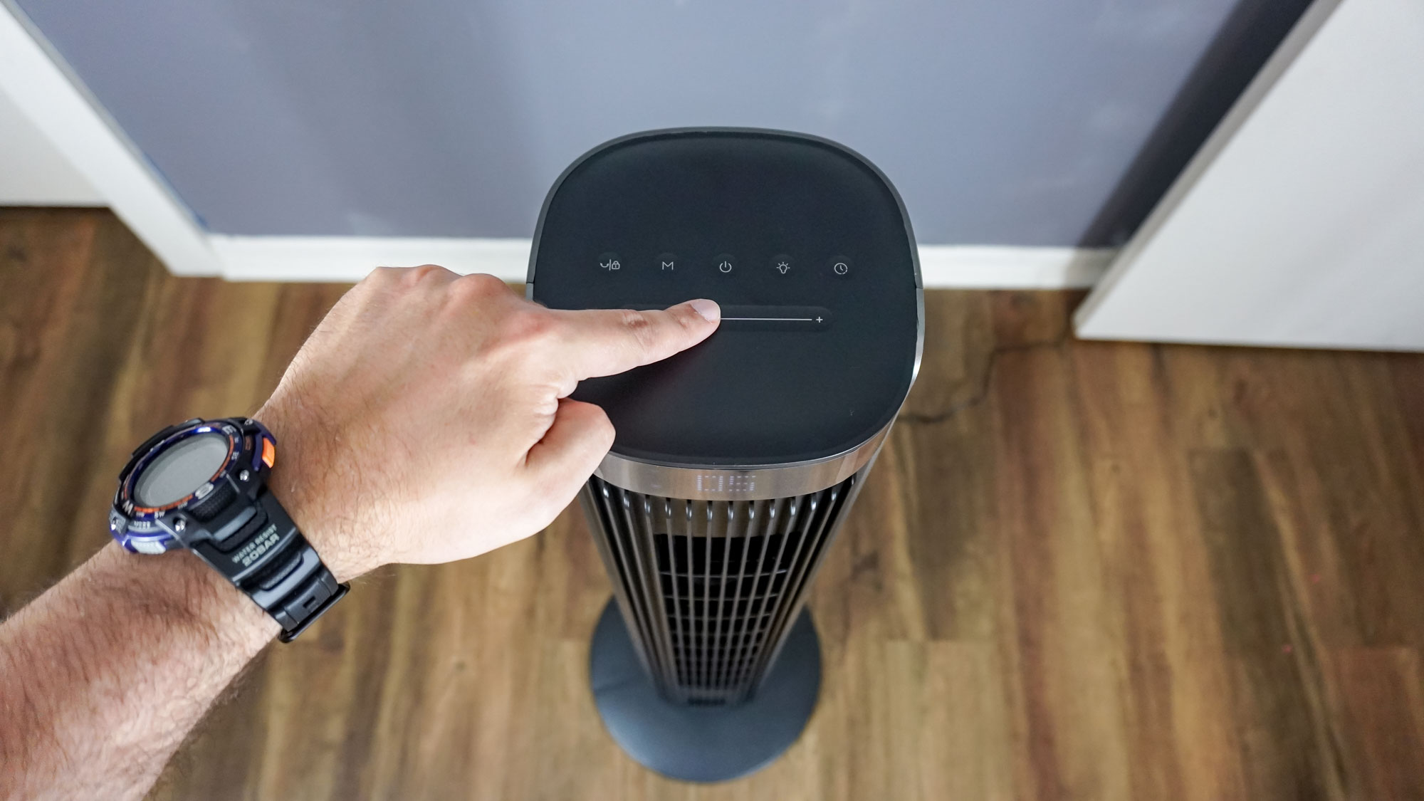 Using the touch-sensitive controls on the top of the Govee Smart Tower Fan 2 Max to change its fan speed