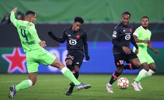 Angel Gomes scores for Lille against Wolfsburg in the Champions League in December 2021.