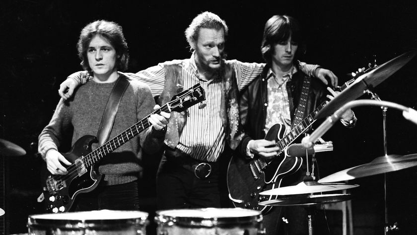 Jack Bruce, Ginger Baker and Eric Clapton from Cream pose together on stage during their farewell performance at the Royal Albert Hall in London on 26th November 1968.