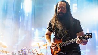 John Petrucci of Dream Theater plays electric guitar onstage