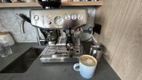 Best coffee makers | Breville Barista Express Impress after making a latte with using the milk frother