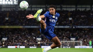 Wesley Fofana of Chelsea tries to control the ball in the air during the Premier League match between Chelsea and Manchester United at Stamford Bridge on April 18, 2026 in London, England. 